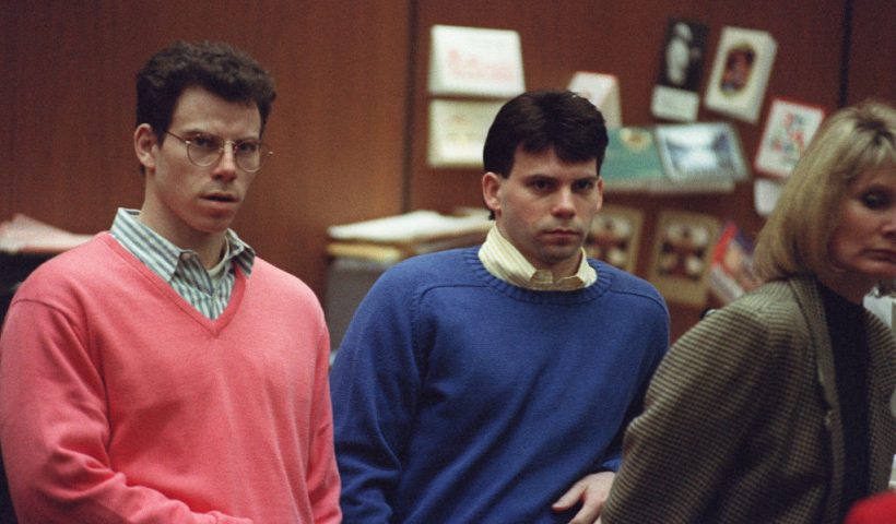 Erik Menendez (L) and his brother Lyle (R) listen during a pre-trial hearing, on December 29, 1992 in Los Angeles after the two pleaded innocent in the August 1989 shotgun deaths of their wealthy parents, Jose and Mary Louise Menendez of Beverly Hills, Calif. It took 40 months for the Superior Court arraignment after prosecutors and defense attorneys battled over the admissibility of taped confessions the brothers allegedly made to their psychotherapist. AFP PHOTO VINCE BUCCI (Photo by VINCE BUCCI / AFP) (Photo by VINCE BUCCI/AFP via Getty Images)