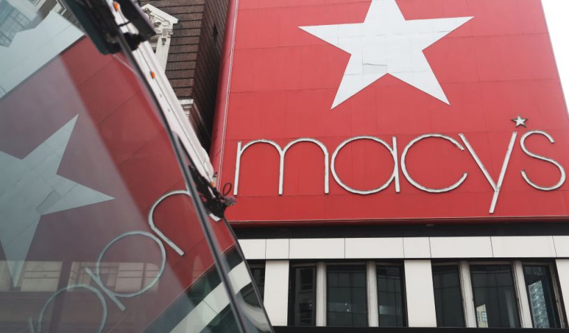 NEW YORK, NEW YORK - MARCH 02: The Macy's company signage is seen at the Herald Square store on March 02, 2023 in New York City. Macy's Inc. stock jumped 14.8% in premarket trade on Thursday, after the department store chain exceeded forecasted estimates for the fourth quarter. The company posted a net income of $508 million for the quarter to Jan. 28, which was down from $742 million in the year-earlier period. While sales fell the company offered upbeat guidance for fiscal 2023. (Photo by Michael M. Santiago/Getty Images)