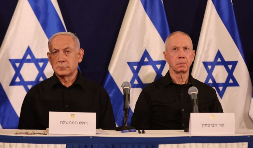 TOPSHOT - Israeli Prime Minister Benjamin Netanyahu (L) and Defence Minister Yoav Gallant attend a press conference in the Kirya military base in Tel Aviv on October 28, 2023 amid ongoing battles between Israel and the Palestinian group Hamas. Netanyahu said on October 28 that fighting inside the Gaza Strip would be "long and difficult", as Israeli ground forces operate in the Palestinian territory for more than 24 hours. (Photo by Abir SULTAN / POOL / AFP) (Photo by ABIR SULTAN/POOL/AFP via Getty Images)