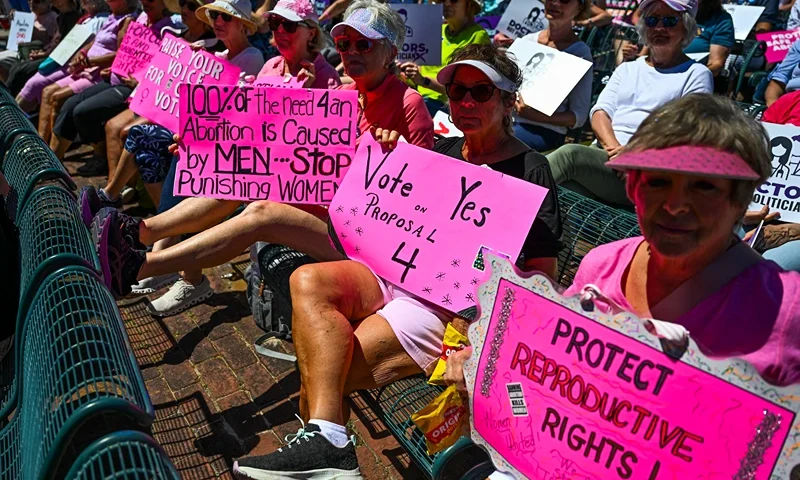 Pro-abortion rights activists participate in the "Rally for Our Freedom" to protect abortion rights for Floridians, in Orlando, Florida, on April 13, 2024. Florida Rising, Floridians Protecting Freedom, and coalition partners officially launched the "Yes on 4" campaign. Florida's Supreme Court on April 1, 2024, paved the way for a ban on abortion after just six weeks of pregnancy, even as it allowed Amendment 4, protecting abortion rights, to be on the ballot in the November 2024 election. (Photo by CHANDAN KHANNA / AFP) (Photo by CHANDAN KHANNA/AFP via Getty Images)