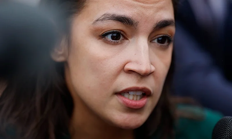 WASHINGTON, DC - SEPTEMBER 25: Rep. Alexandria Ocasio-Cortez (D-NY) speaks to reporters as she arrives for a vote series at the U.S. Capitol on September 25, 2024 in Washington, DC. In a 341 to 82 vote, the House of Representatives passed legislation to avoid a funding lapse and government shutdown. (Photo by Anna Moneymaker/Getty Images)