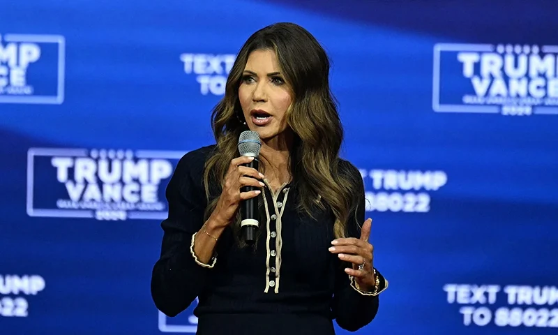 Moderator and South Dakota Governor Kristi Noem speaks before former US President and Republican presidential candidate Donald Trump attends during a town hall at the Greater Philadelphia Expo Center and Fairgrounds in Oaks, Pennsylvania, on October 14, 2024. (Photo by Jim WATSON / AFP) (Photo by JIM WATSON/AFP via Getty Images)