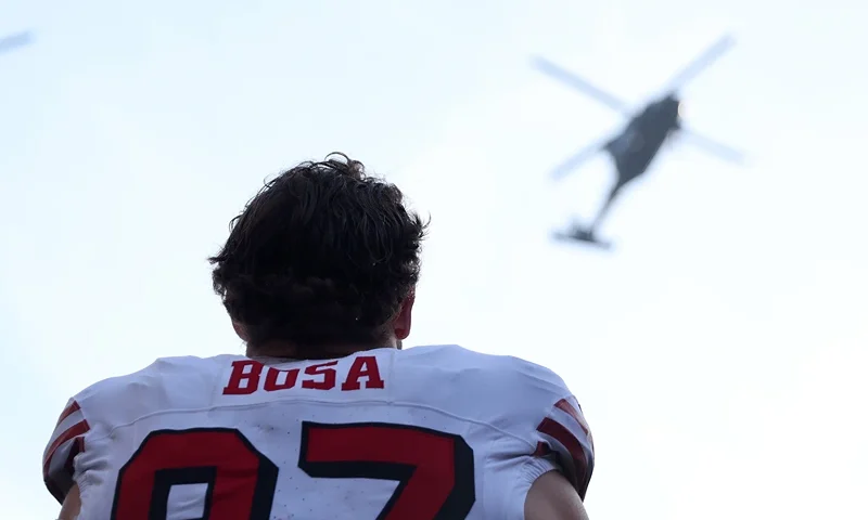SEATTLE, WASHINGTON - OCTOBER 10: Nick Bosa #97 of the San Francisco 49ers watches a flyover before the game against the Seattle Seahawks at Lumen Field on October 10, 2024 in Seattle, Washington. (Photo by Steph Chambers/Getty Images)