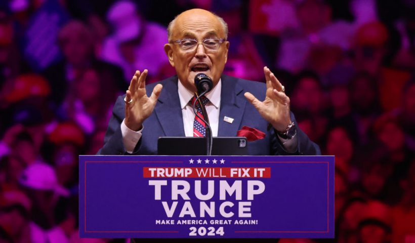 NEW YORK, NEW YORK - OCTOBER 27: Rudy Giuliani, former Mayor of New York City, speaks prior to Republican presidential nominee, former U.S. President Donald Trump taking the state at a campaign rally at Madison Square Garden on October 27, 2024 in New York City. Trump closed out his weekend of campaigning in NYC with a guest list of speakers that includes his running mate Republican vice presidential nominee, Sen. J.D. Vance (R-OH), Tesla CEO Elon Musk, UFC CEO Dana White, and House Speaker Mike Johnson (R-LA), among others, nine days before Election Day. (Photo by Michael M. Santiago/Getty Images)
