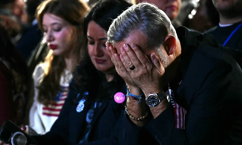 A supporter reacts to election results during an election night event for US Vice President and Democratic presidential candidate Kamala Harris at Howard University in Washington, DC, on November 5, 2024. (Photo by ANGELA WEISS / AFP) (Photo by ANGELA WEISS/AFP via Getty Images)