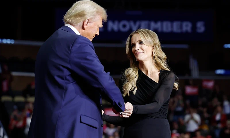 Republican presidential nominee, former President Donald Trump greets media personality Megyn Kelly at his campaign rally at the PPG Paints Arena on November 04, 2024 in Pittsburgh, Pennsylvania. With one day left before the general election, Trump is campaigning for re-election in the battleground states of North Carolina, Pennsylvania and Michigan. (Photo by Chip Somodevilla/Getty Images)