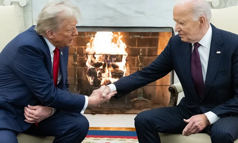 US President Joe Biden shakes hands with US President-elect Donald Trump during a meeting in the Oval Office of the White House in Washington, DC, on November 13, 2024. Trump thanked Biden for pledging a smooth transfer of power as the victorious Republican made a historic return visit to the White House on Wednesday. (Photo by SAUL LOEB / AFP) (Photo by SAUL LOEB/AFP via Getty Images)