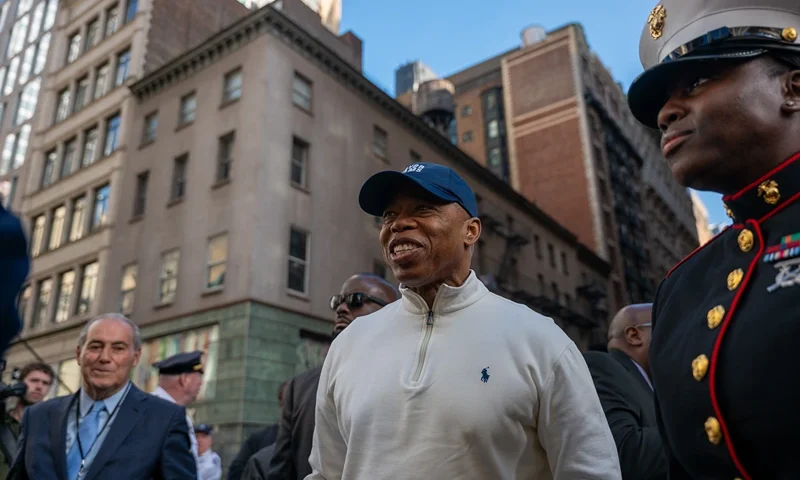 NEW YORK, NEW YORK - NOVEMBER 11: New York City Mayor Eric Adams joins others in the 105th annual Veterans Day Parade on November 11, 2024, in New York City. Hundreds of people lined 5th Avenue to watch the biggest Veterans Day parade in the United States. This year's event included veterans, active soldiers, police officers, firefighters, and dozens of school groups participating in the parade, which honors the men and women who have served and sacrificed for the country. (Photo by Spencer Platt/Getty Images)