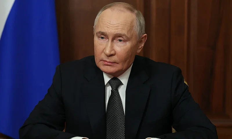 TOPSHOT - In this pool photograph distributed by the Russian state agency Sputnik, Russia's President Vladimir Putin delivers a televised address to the nation at the Kremlin in Moscow on November 21, 2024. Russian President Vladimir Putin said on November 21, 2024 that the country's forces had hit Ukraine with a new mid-range ballistic missile. (Photo by Vyacheslav PROKOFYEV / POOL / AFP) (Photo by VYACHESLAV PROKOFYEV/POOL/AFP via Getty Images)