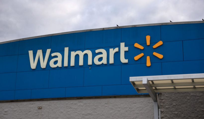 MIAMI, FLORIDA - NOVEMBER 18: A Walmart sign is displayed outside a Supercenter on November 18, 2024 in Miami, Florida. Walmart is set to report its third-quarter results on Tuesday, Nov. 19th. (Photo by Joe Raedle/Getty Images)