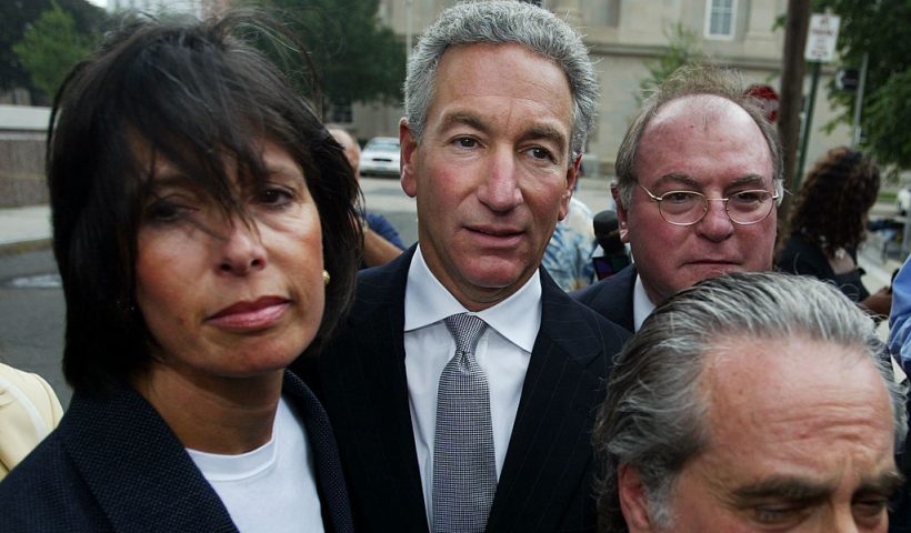NEWARK, NJ - AUGUST 18: Charles Kushner (C) wades though the media with his legal team and wife to the U.S. District Courthouse August 18, 2004 in Newark, New Jersey. Kushner, a New Jersey developer and a major campaign contributors to Democrats including embattled Gov. Jim McGreevey, is expected to plead guilty to federal charges that he hired a prostitute to try to silence a witness in a federal investigation. (Photo by Chris Hondros/Getty Images)