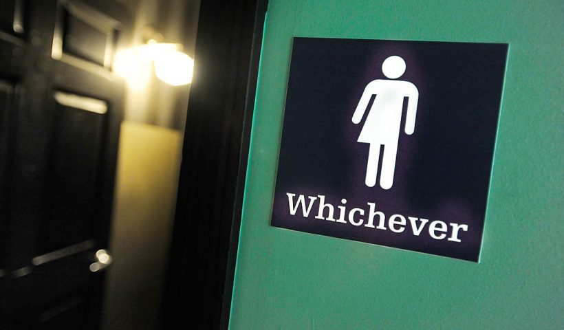 DURHAM, NC - MAY 11: A gender neutral sign is posted outside a bathrooms at Oval Park Grill on May 11, 2016 in Durham, North Carolina. Debate over transgender bathroom access spreads nationwide as the U.S. Department of Justice countersues North Carolina Governor Pat McCrory from enforcing the provisions of House Bill 2 (HB2) that dictate what bathrooms transgender individuals can use. (Photo by Sara D. Davis/Getty Images)