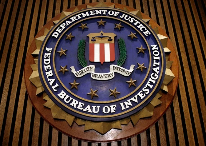 WASHINGTON - MARCH 09: The seal of the F.B.I. hangs in the Flag Room at the bureau's headquaters March 9, 2007 in Washington, DC. F.B.I. Director Robert Mueller was responding to a report by the Justice Department inspector general that concluded the FBI had committed 22 violations in its collection of information through the use of national security letters. The letters, which the audit numbered at 47,000 in 2005, allow the agency to collect information like telephone, banking and e-mail records without a judicially approved subpoena. (Photo by Chip Somodevilla/Getty Images)