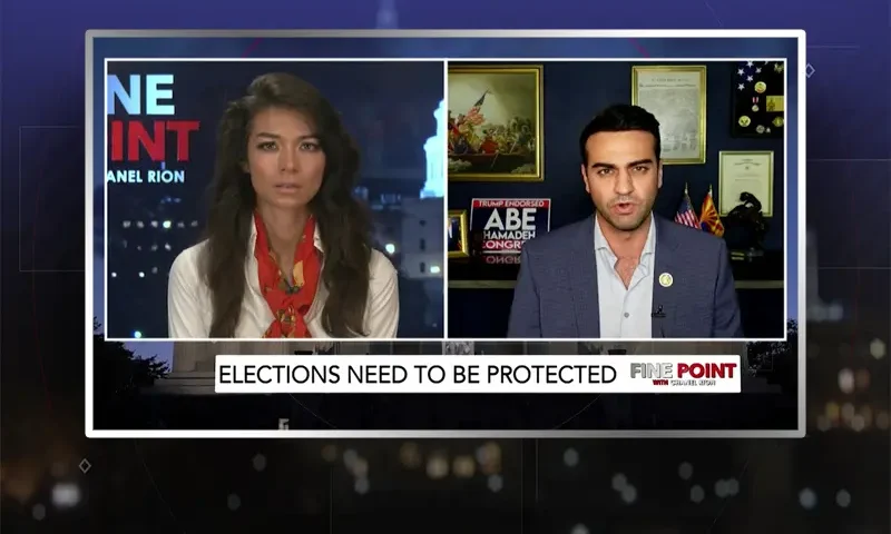 Video still from Fine Point on One America News Network showing a split screen of the host on the left side, and on the right side is the guest, Abe Hamadeh.