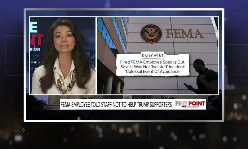 Video still of the host of Fine Point at the desk of their talk show on One America News Network.