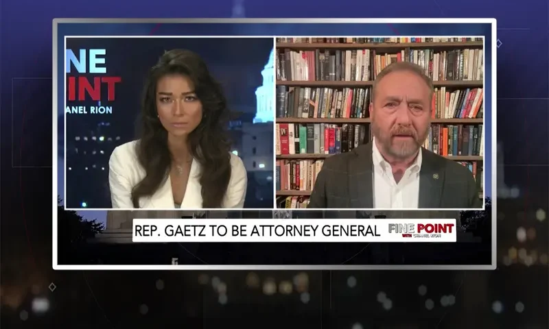 Video still from Fine Point on One America News Network showing a split screen of the host on the left side, and on the right side is the guest, Dave Yost.