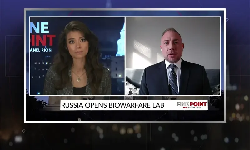Video still from Fine Point on One America News Network showing a split screen of the host on the left side, and on the right side is the guest, Dr. Andrew Huff.