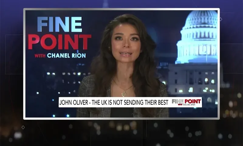 Video still of the host of Fine Point at the desk of their talk show on One America News Network.
