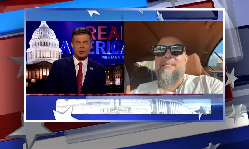 Video still from Real America on One America News Network showing a split screen of the host on the left side, and on the right side is the guest, Josh Macciello.