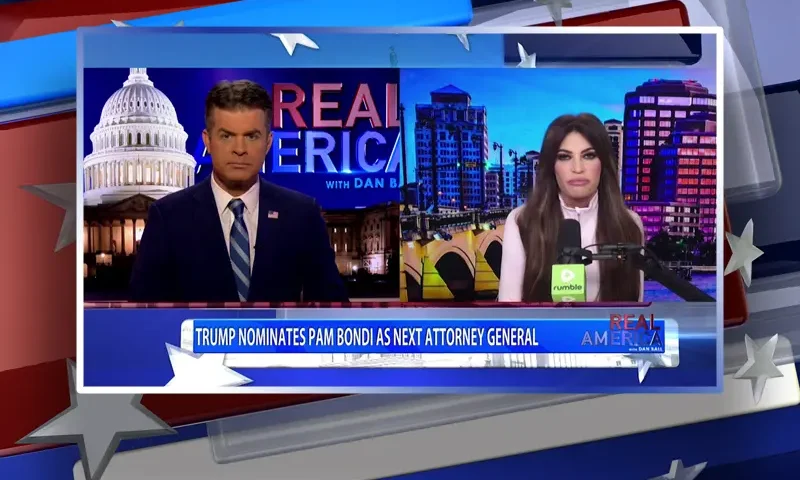 Video still from Real America on One America News Network showing a split screen of the host on the left side, and on the right side is the guest, Kimberly Guilfoyle.
