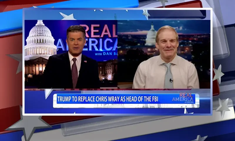Video still from Real America on One America News Network showing a split screen of the host on the left side, and on the right side is the guest, Rep. Jim Jordan.