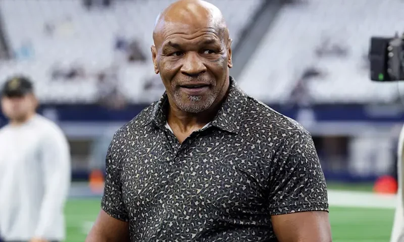 Boxer Mike Tyson on the field before the game between the Dallas Cowboys and New Orleans Saints at AT&T Stadium. Mandatory Credit: Kevin Jairaj-Imagn Images/File Photo