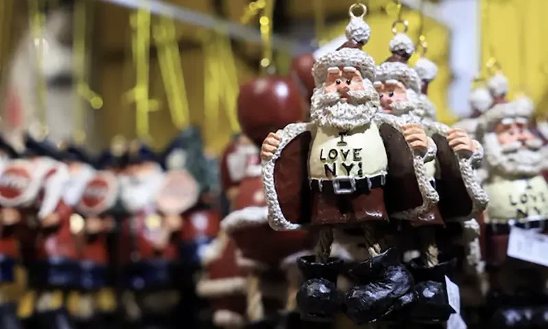 An item depicting Santa Claus hangs in a gift shop, in Bryant Park, in New York City, New York U.S., December 9, 2024. REUTERS/Kent Edwards/File Photo