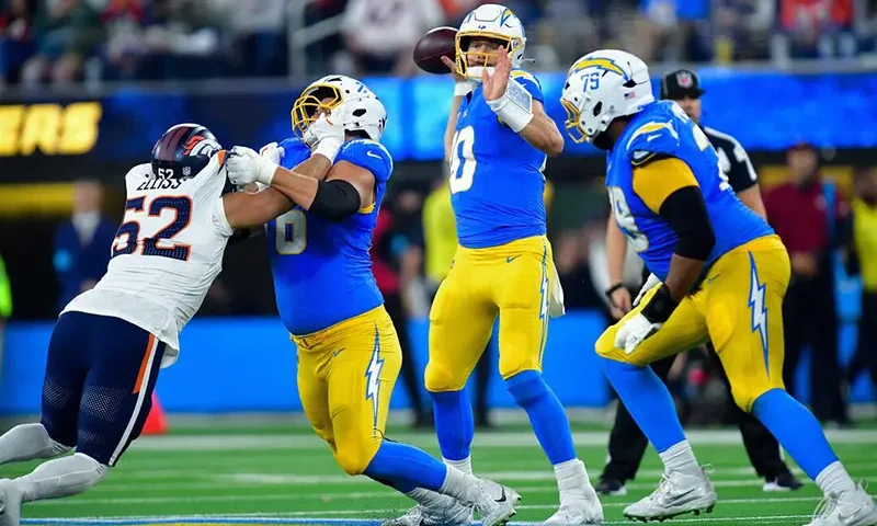 Los Angeles Chargers quarterback Justin Herbert (10) throws against the Denver Broncos during the first half at SoFi Stadium. Mandatory Credit: Gary A. Vasquez-Imagn Images