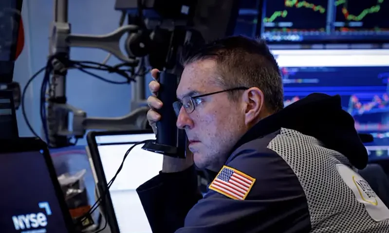 A trader works on the floor at the New York Stock Exchange (NYSE) in New York City, U.S., December 2, 2024. REUTERS/Brendan McDermid