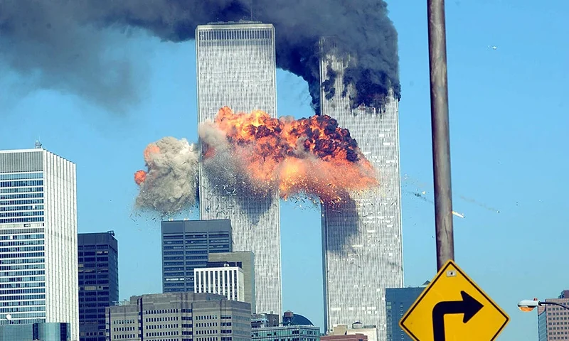 394261 14: A fiery blasts rocks the World Trade Center after being hit by two planes September 11, 2001 in New York City. (Photo by Spencer Platt/Getty Images)
