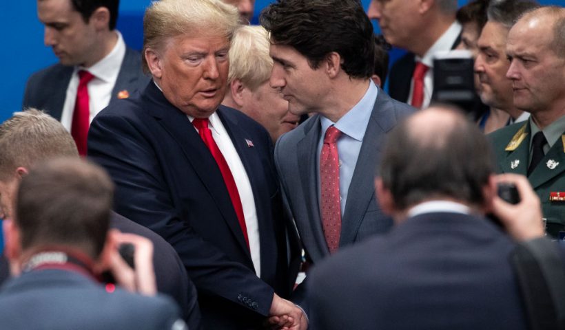 HERTFORD, ENGLAND - DECEMBER 04: U.S. President Donald Trump (L) ad Canadian Prime Minister Justin Trudeau (R) attend the NATO summit at the Grove Hotel on December 4, 2019 in Watford, England. France and the UK signed the Treaty of Dunkirk in 1947 in the aftermath of WW2 cementing a mutual alliance in the event of an attack by Germany or the Soviet Union. The Benelux countries joined the Treaty and in April 1949 expanded further to include North America and Canada followed by Portugal, Italy, Norway, Denmark and Iceland. This new military alliance became the North Atlantic Treaty Organisation (NATO). The organisation grew with Greece and Turkey becoming members and a re-armed West Germany was permitted in 1955. This encouraged the creation of the Soviet-led Warsaw Pact delineating the two sides of the Cold War. This year marks the 70th anniversary of NATO. (Photo by Dan Kitwood/Getty Images)