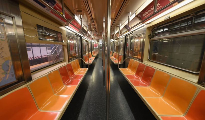 TOPSHOT - An empty New York Subway car is seen on March 23, 2020 in New York City. - Wall Street fell early March 23, 2020 as Congress wrangled over a massive stimulus package while the Federal Reserve unveiled new emergency programs to boost the economy including with unlimited bond buying. About 45 minutes into trading, the Dow Jones Industrial Average was down 0.6 percent at 19,053.17, and the broad-based S&P 500 also fell 0.6 percent to 2,290.31 after regaining some ground lost just after the open. (Photo by Angela Weiss / AFP) (Photo by ANGELA WEISS/AFP via Getty Images)