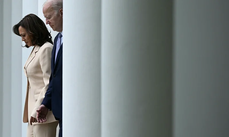 TOPSHOT - US Vice President Kamala Harris and US President Joe Biden arrive to deliver remarks during National Small Business Week, in the Rose Garden of the White House in Washington, DC, on May 1, 2023. (Photo by Brendan SMIALOWSKI / AFP) (Photo by BRENDAN SMIALOWSKI/AFP via Getty Images)