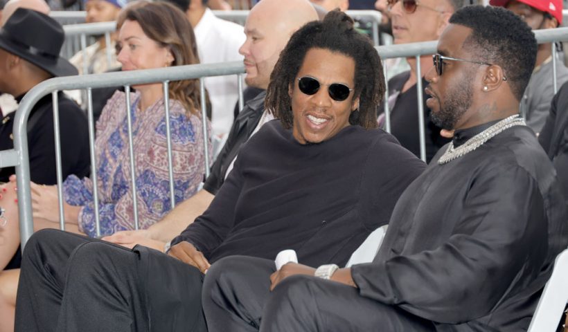 HOLLYWOOD, CALIFORNIA - APRIL 11: (L-R) Fat Joe, Jay-Z and Sean Combs attend the Hollywood Walk of Fame Star Ceremony for DJ Khaled on April 11, 2022 in Hollywood, California. (Photo by Kevin Winter/Getty Images)
