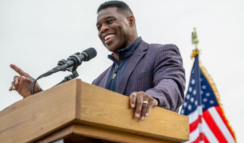 MCDONOUGH, GEORGIA - NOVEMBER 16: Republican U.S. Senate candidate Herschel Walker speaks to supporters at a campaign rally on November 16, 2022 in McDonough, Georgia. Walker, the University of Georgia Heisman Trophy winner and former NFL running back, continues campaigning across the state ahead of a runoff election against incumbent Sen. Raphael Warnock (D-GA) on December 6. (Photo by Brandon Bell/Getty Images)