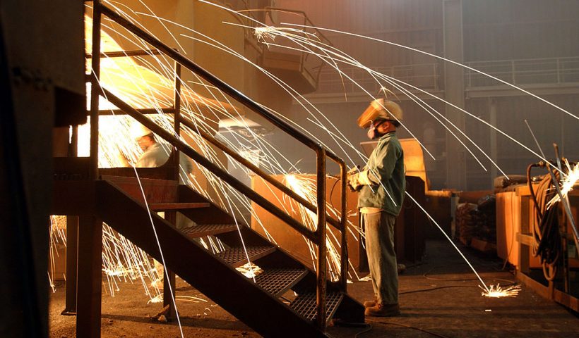 RANCHO CUCAMONGA, CA - OCTOBER 4: A worker is surrounded by sparks from molten steel flowing into casts at the TAMCO steel mini mill on October 4, 2002 in Rancho Cucamonga, California. TAMCO, California's only steel mill, has managed to persevere through skyrocketed electrical rates as it uses electric arc furnace technology to turn scrap steel into concrete reinforcing bars (rebar). Last March, the Bush administration imposed tariffs of 8 percent to 30 percent on certain kinds of steel imports, a move that now has the European Union threatening to retaliate by seeking $350 million in steel trade sanctions against the United States. Nationally, 34 steel companies have gone bankrupt and 17 have shut down since the 1997 Asian financial crisis, putting 52,000 steelworkers out of work. (Photo by David McNew/Getty Images)