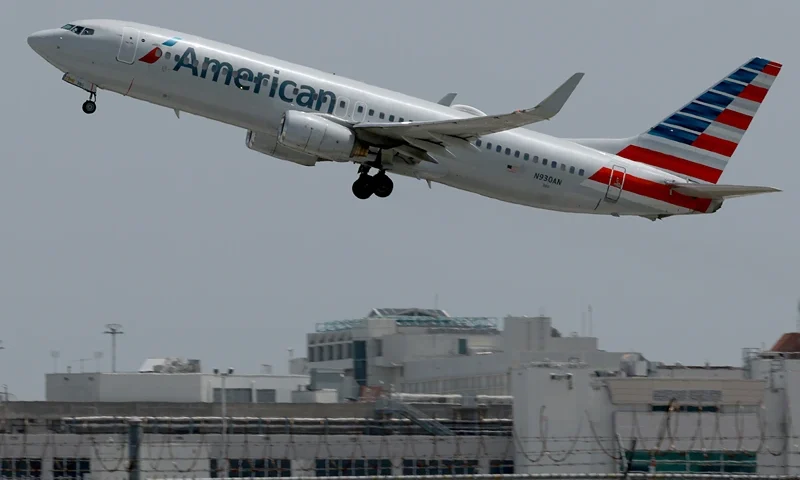 An American Airlines plane takes off from the Miami International Airport on July 20, 2023 in Miami, Florida. The company reported a record quarterly revenue of $14.1 billion, a 4.7% increase from the prior year. (Photo by Joe Raedle/Getty Images)
