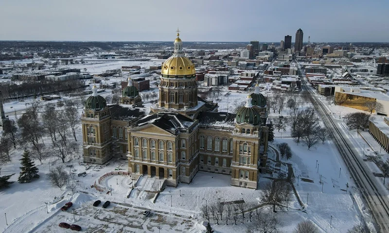 TOPSHOT - Snow and ice surround the Iowa State Capitol Building in Des Moines, Iowa, on January 15, 2024. Voters will brave subzero temperatures to caucus for their presidential candidate of choice later in the day. (Photo by Christian Monterrosa / AFP) (Photo by CHRISTIAN MONTERROSA/AFP via Getty Images)