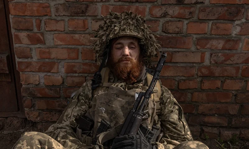 TOPSHOT - A Ukrainian infantry soldier of the 23rd Mechanized Brigade waits to head toward the frontline in the Avdiivka direction, in the Donetsk region, on April 3, 2024, amid the Russian invasion of Ukraine. (Photo by Roman PILIPEY / AFP) (Photo by ROMAN PILIPEY/AFP via Getty Images)