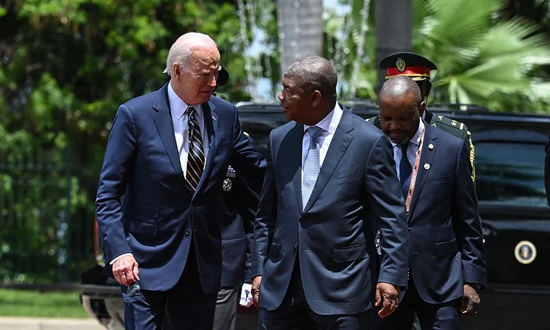 US President Joe Biden (CL) is welcomed by Angola President Joao Lourenco (CR) ahead of their bilateral meeting at the Presidential Palace in Luanda on December 3, 2024. (Photo by ANDREW CABALLERO-REYNOLDS / AFP) (Photo by ANDREW CABALLERO-REYNOLDS/AFP via Getty Images)