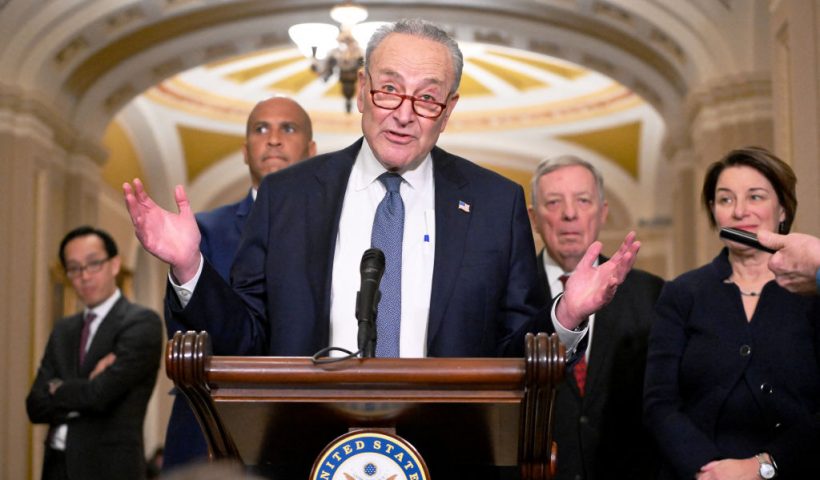 US Senate Majority Leader Chuck Schumer, with Democratic majority whip Dick Durbin (2nd R, Senator Amy Klobuchar (R) and Senator Cory Booker (2nd L), speaks with reporters at the US Capitol on December 3, 2024. Senate Democrats held a closed-door election December 3 to name their leadership posts for the next two years. Schumer was re-elected to lead Democratic Senators as Minority Leader in the 119th Congress. (Photo by ROBERTO SCHMIDT / AFP) (Photo by ROBERTO SCHMIDT/AFP via Getty Images)
