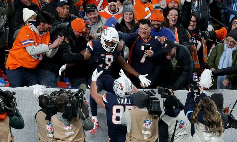 Marvin Mims Jr. #19 of the Denver Broncos celebrates after scoring a 93 yard touchdown against the Cleveland Browns during the third quarter in the game at Empower Field At Mile High on December 02, 2024 in Denver, Colorado. (Photo by Matthew Stockman/Getty Images)