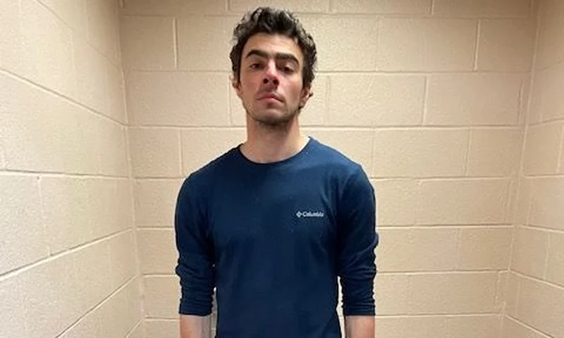 ALTOONA, PENNSYLVANIA - DECEMBER 09: (EDITOR’S NOTE: This Handout image was provided by a third-party organization and may not adhere to Getty Images’ editorial policy.) In this handout photo released by the Altoona Police Department, Luigi Mangione is seen in a holding cell after being taken into custody on December 9, 2024 in Altoona, Pennsylvania. According to the Pennsylvania Department of Corrections, Mangione, the suspect in the shooting of UnitedHealthcare CEO Brian Thompson in New York City, has been moved to the State Correctional Institution (SCI) in Huntingdon, Pennsylvania. (Photo by Altoona Police Department via Getty Images)