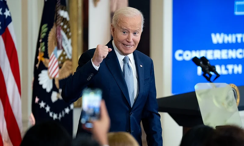 WASHINGTON, DC - DECEMBER 11: U.S. President Joe Biden pumps his fist as he departs the first White House conference on women's health research in the East Room of the White House on December 11, 2024 in Washington, DC. Business and philanthropic leaders, academic researchers, women's health advocates, investors, and federal agency representatives come together to continue making progress on improving women's health. (Photo by Andrew Harnik/Getty Images)