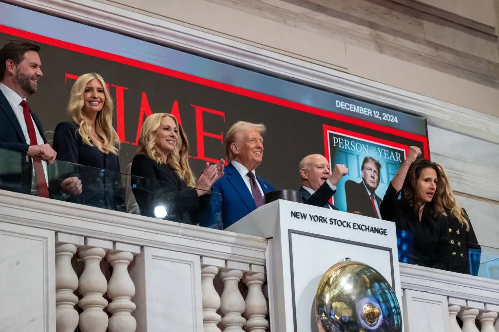 Trump Rings Opening Bell At NYSE With Melania And Daughters, Framed By Time ‘Person Of The Year’ Cover