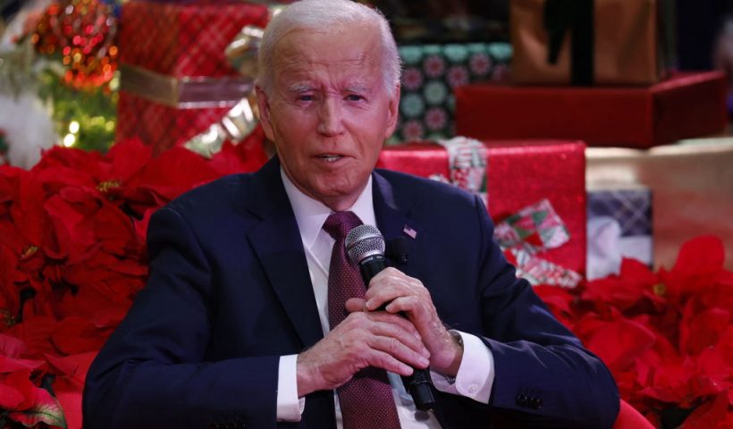 US President Joe Biden speaks during a holiday visit to patients and families at Children's National Hospital in Washington, DC, on December 20, 2024. (Photo by Ting Shen / AFP) (Photo by TING SHEN/AFP via Getty Images)