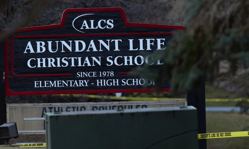 A sign sits in front of the Abundant Life Christian School on December 16, 2024 in Madison, Wisconsin. According to reports, a student and teacher were shot and killed at the school earlier today, and the suspected shooter was found dead at the scene. (Photo by Scott Olson/Getty Images)