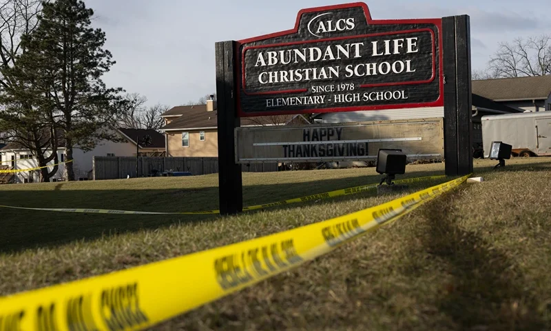 Crime scene tape continues to be stretched around Abundant Life Christian School as police continue to investigate yesterday's shooting on December 17, 2024 in Madison, Wisconsin. Multiple people were shot and at least three have died after a teenage girl, who was a student at the school, opened fire inside the school. (Photo by Scott Olson/Getty Images)