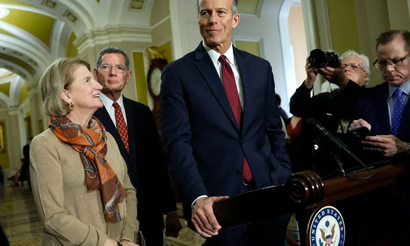 WASHINGTON, DC - DECEMBER 17: Incoming U.S. Senate Majority Leader John Thune (R-SD) (R) speaks to reporters following the weekly Senate luncheon at the U.S. Capitol on December 17, 2024 in Washington, DC. Thune spoke on the passing of the National Defense Authorization Act and the upcoming government funding bill. Thune was joined by Sen. Shelley Moore Capito (R-WV) (L) and Sen. John Barrasso (R-WY). (Photo by Kevin Dietsch/Getty Images)