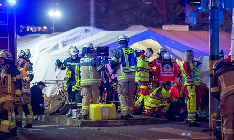 MAGDEBURG, GERMANY - DECEMBER 20: Police vans and ambulances stand next to the annual Christmas market in the city center following a possible terror incident on December 20, 2024 in Magdeburg, Germany. According to initial reports at least one person is dead and dozens injured after a car drove into the crowded Christmas market. Police reportedly arrested the driver. (Photo by Craig Stennett/Getty Images)